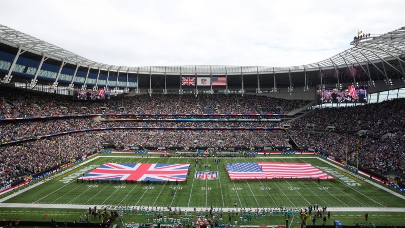 Oct 17, 2021; London, England, United Kingdom; A general overall view of Tottenham Hotspur Stadium with the British and the United States flags on the field during the playing of the national anthem before the  NFL International Series game between the Miami Dolphins and the Jacksonville Jaguars. Mandatory Credit: Kirby Lee-USA TODAY Sports