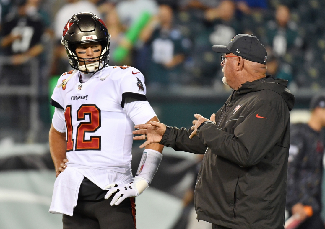 Oct 14, 2021; Philadelphia, Pennsylvania, USA; Tampa Bay Buccaneers quarterback Tom Brady (12) and head coach Bruce Arians during warmups against the Philadelphia Eagles at Lincoln Financial Field. Mandatory Credit: Eric Hartline-USA TODAY Sports