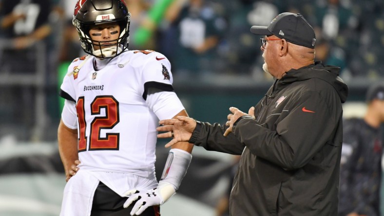 Oct 14, 2021; Philadelphia, Pennsylvania, USA; Tampa Bay Buccaneers quarterback Tom Brady (12) and head coach Bruce Arians during warmups against the Philadelphia Eagles at Lincoln Financial Field. Mandatory Credit: Eric Hartline-USA TODAY Sports