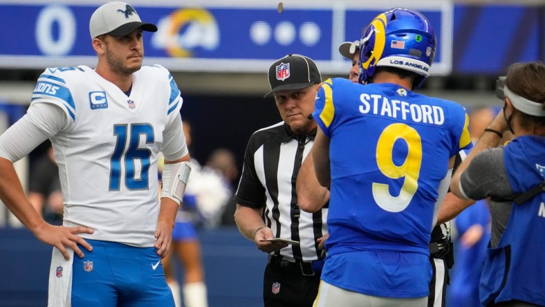 Oct 24, 2021; Inglewood, California, USA; Detroit Lions quarterback Jared Goff (16) and Los Angeles Rams quarterback Matthew Stafford (9) during the coin flip before the start of the Rams-Lions game at SoFi Stadium. Mandatory Credit: Robert Hanashiro-USA TODAY Sports