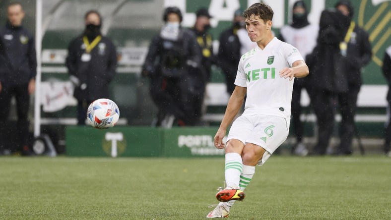 Nov 7, 2021; Portland, Oregon, USA; Austin FC midfielder Sebastian Berhalter (6) kicks the ball during the first half against the Portland Timbers at Providence Park. Mandatory Credit: Soobum Im-USA TODAY Sports