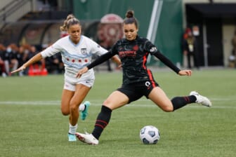 Nov 14, 2021; Portland, OR, USA; Portland Thorns forward Sophia Smith (9) attempts to score as Chicago Red Stars  defender Sarah Gorden (11 defends during the second half of the NWSL semi final at Providence Park. Mandatory Credit: Soobum Im-USA TODAY Sports