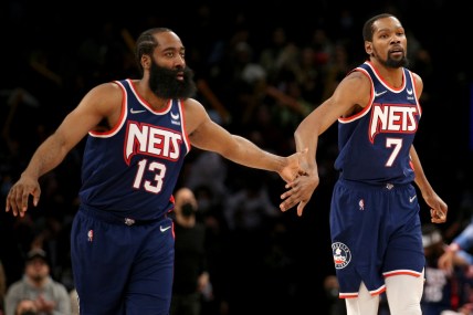 Dec 3, 2021; Brooklyn, New York, USA; Brooklyn Nets forward Kevin Durant (7) celebrates with guard James Harden (13) after a basket against the Minnesota Timberwolves during the fourth quarter at Barclays Center. Mandatory Credit: Brad Penner-USA TODAY Sports