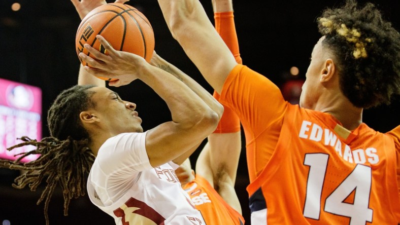 Florida State Seminoles guard Caleb Mills (4) shoots for two. The Florida State Seminoles lead the Syracuse Orange 32-24 at the half Saturday, Dec. 4, 2021.

Fsu V Syracuse Mens Basketball057