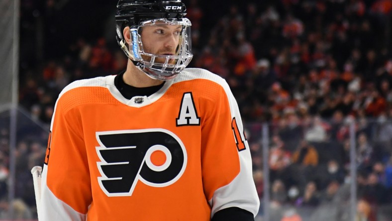 Dec 6, 2021; Philadelphia, Pennsylvania, USA; Philadelphia Flyers center Sean Couturier (14) against the Colorado Avalanche at Wells Fargo Center. Mandatory Credit: Eric Hartline-USA TODAY Sports