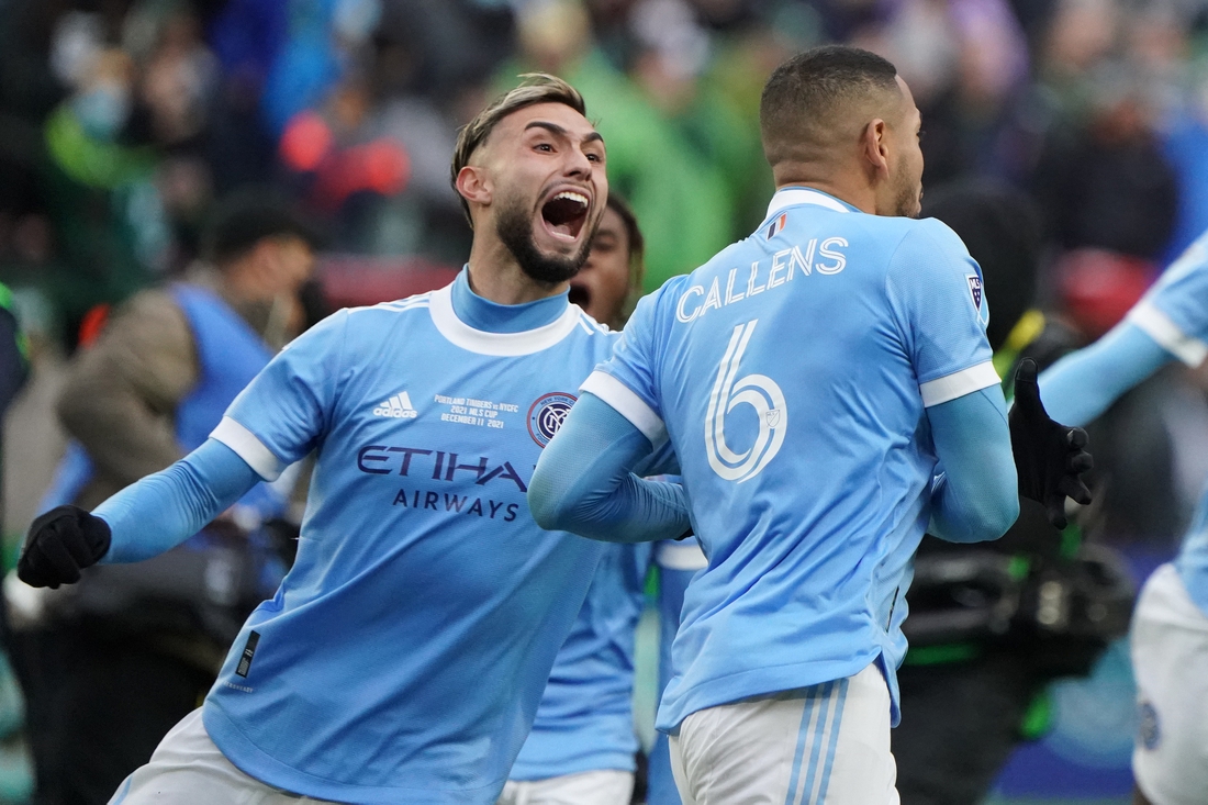 Dec 11, 2021; Portland, OR, USA; New York City FC defender Alexander Callens (6) celebrates with midfielder Valentin Castellanos (left) after defeating the Portland Timbers in the 2021 MLS Cup championship game at Providence Park. Mandatory Credit: John David Mercer-USA TODAY Sports