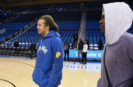 Dec 15, 2021; Los Angeles, California, USA; UCLA Bruins forward Mac Etienne (left) and guard Jaylen Clark (right) look on after the game against the Alabama State Hornets was cancelled due to COVID-19 protocols at Pauley Pavilion presented by Wescom. Mandatory Credit: Richard Mackson-USA TODAY Sports