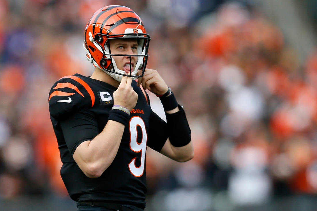 Cincinnati Bengals quarterback Joe Burrow (9) peeks up to the video board as he returns to the line in the second quarter of the NFL Week 16 game between the Cincinnati Bengals and the Baltimore Ravens at Paul Brown Stadium in downtown Cincinnati on Sunday, Dec. 26, 2021. The Bengals led 31-14 at halftime.

Baltimore Ravens At Cincinnati Bengals Week 16