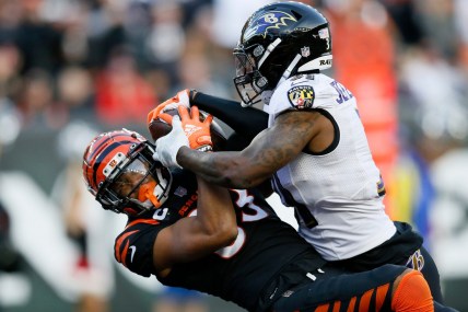 Cincinnati Bengals wide receiver Tyler Boyd (83) pulls in a pass over Baltimore Ravens safety Tony Jefferson (31) for a touchdown reception before the play is overturned after official review in the fourth quarter of the NFL Week 16 game between the Cincinnati Bengals and the Baltimore Ravens at Paul Brown Stadium in downtown Cincinnati on Sunday, Dec. 26, 2021. The Bengals improved to 9-6 on the season with a 41-21 win over the Ravens.

Baltimore Ravens At Cincinnati Bengals Week 16