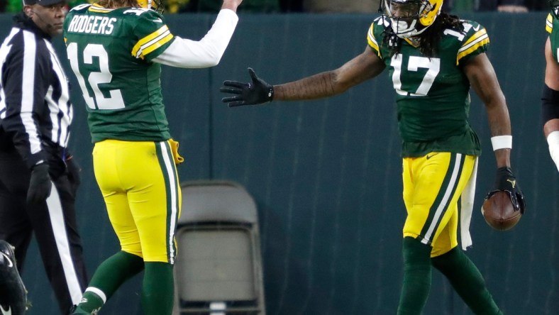 Green Bay Packers quarterback Aaron Rodgers (12) celebrates with wide receiver Davante Adams (17) after scoring a touchdown in the second quarter during their football game Saturday, December 25, 2021, at Lambeau Field in Green Bay, Wis. The touchdown Adams ahead of Jordy Nelsons for touchdown receptions from Rodgers.Dan Powers/USA TODAY NETWORK-Wisconsin

Apc Packvsbrowns 1225211374djp