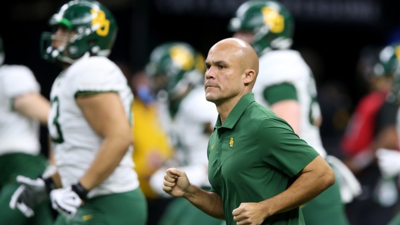 Jan 1, 2022; New Orleans, LA, USA; Baylor Bears head coach Dave Aranda runs onto the field before the 2022 Sugar Bowl against the Mississippi Rebels at the Caesars Superdome. Mandatory Credit: Chuck Cook-USA TODAY Sports