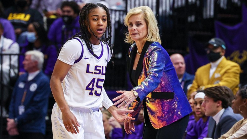 Jan 6, 2022; Baton Rouge, Louisiana, USA;  LSU Lady Tigers head coach Kim Mulkey talks to guard Alexis Morris (45) during a time out against the South Carolina Gamecocks during the first half  at the Pete Maravich Assembly Center. Mandatory Credit: Stephen Lew-USA TODAY Sports