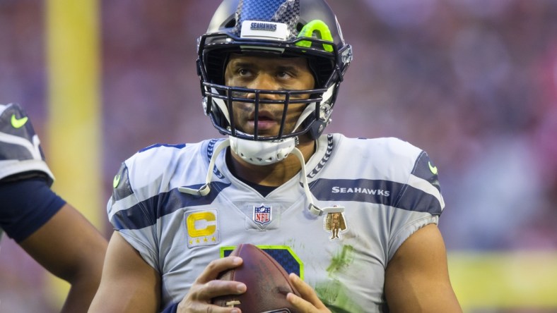 Jan 9, 2022; Glendale, Arizona, USA; Seattle Seahawks quarterback Russell Wilson (3) against the Arizona Cardinals at State Farm Stadium. Mandatory Credit: Mark J. Rebilas-USA TODAY Sports