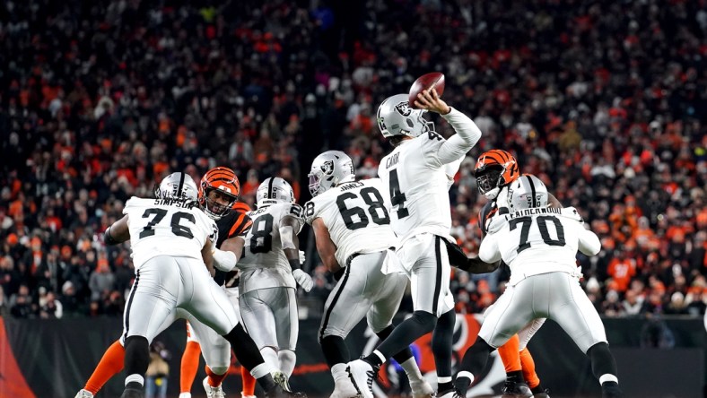 Las Vegas Raiders quarterback Derek Carr (4) throws from the pocket in the third quarter during an NFL AFC wild-card playoff game against the Cincinnati Bengals, Saturday, Jan. 15, 2022, at Paul Brown Stadium in Cincinnati. The Cincinnati Bengals defeated the Las Vegas Raiders, 26-19 to win the franchise's first playoff game in 30 years.

Las Vegas Raiders At Cincinnati Bengals Jan 15 Afc Wild Card Game