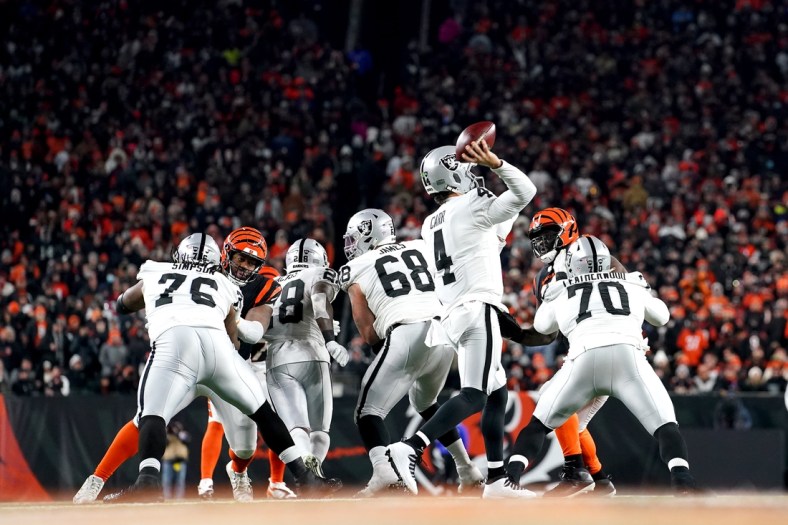 Las Vegas Raiders quarterback Derek Carr (4) throws from the pocket in the third quarter during an NFL AFC wild-card playoff game against the Cincinnati Bengals, Saturday, Jan. 15, 2022, at Paul Brown Stadium in Cincinnati. The Cincinnati Bengals defeated the Las Vegas Raiders, 26-19 to win the franchise's first playoff game in 30 years.

Las Vegas Raiders At Cincinnati Bengals Jan 15 Afc Wild Card Game