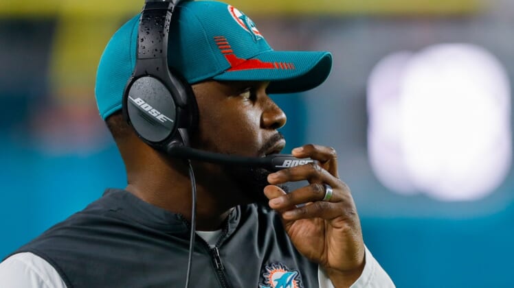 Jan 9, 2022; Miami Gardens, Florida, USA; Miami Dolphins head coach Brian Flores watches from the sideline during the second quarter of the game against the New England Patriots at Hard Rock Stadium. Mandatory Credit: Sam Navarro-USA TODAY Sports