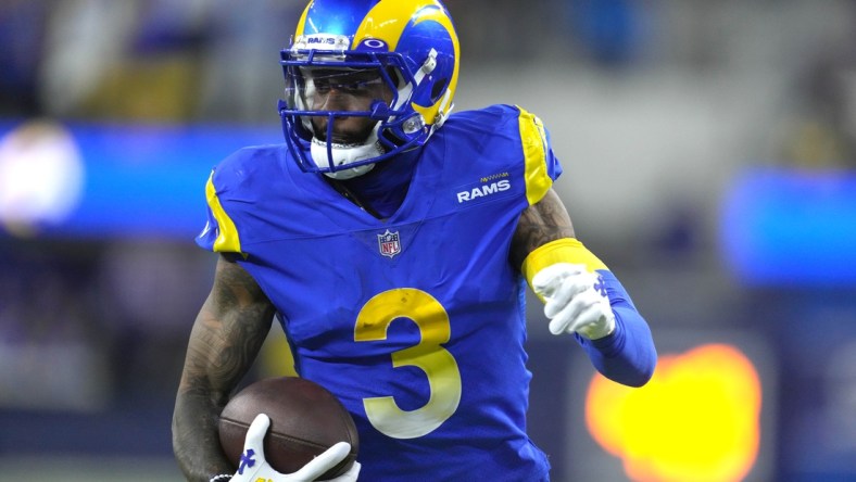 Jan 17, 2022; Inglewood, California, USA; Los Angeles Rams wide receiver Odell Beckham Jr. (3) carries the ball against the Arizona Cardinals during the first half of an NFC Wild Card playoff football game at SoFi Stadium. Mandatory Credit: Kirby Lee-USA TODAY Sports