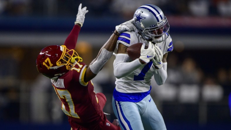 Dec 26, 2021; Arlington, Texas, USA; Washington Football Team wide receiver Terry McLaurin (17) and Dallas Cowboys cornerback Trevon Diggs (7) in action during the game between the Washington Football Team and the Dallas Cowboys at AT&T Stadium. Mandatory Credit: Jerome Miron-USA TODAY Sports