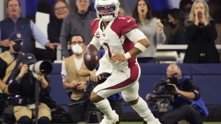 Jan 17, 2022; Los Angeles, California, USA;  Arizona Cardinals quarterback Kyler Murray (1) scrambles out of the pocket against the Los Angeles Rams during the second quarter of the NFC Wild Card playoff game.Nfc Wild Card Playoff Cardinals Vs Rams