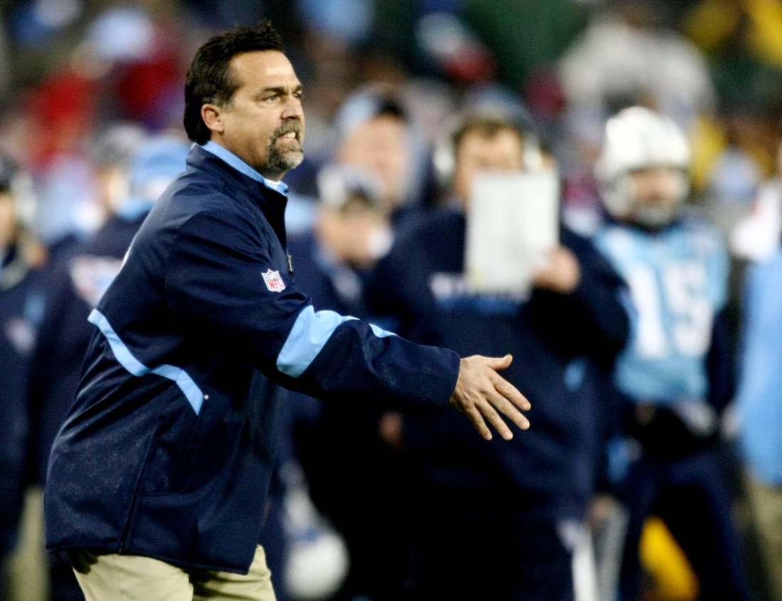 Tennessee Titans head coach Jeff Fisher isn't happy about what going on the field against Baltimore Ravens during the AFC Divisional Round playoff game at LP Field in Nashville Jan. 10, 2009.