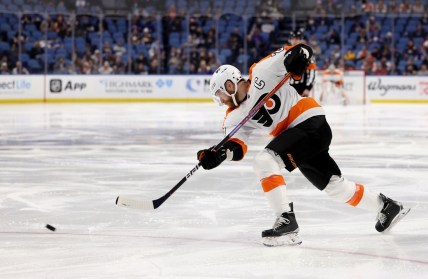 Jan 22, 2022; Buffalo, New York, USA;  Philadelphia Flyers center Claude Giroux (28) takes a shot on goal during the third period against the Buffalo Sabres at KeyBank Center. Mandatory Credit: Timothy T. Ludwig-USA TODAY Sports