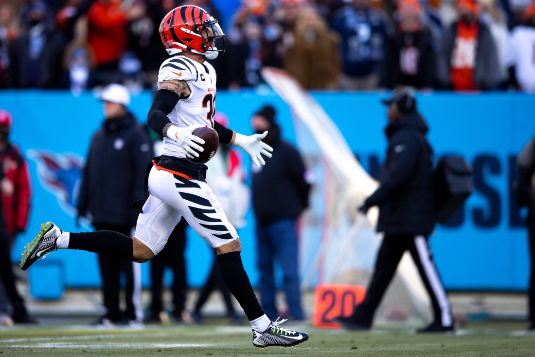 Cincinnati Bengals free safety Jessie Bates (30) celebrates after an interception during an NFL divisional playoff football game, Saturday, Jan. 22, 2022, at Nissan Stadium in Nashville, Tenn. Cincinnati Bengals defeated Tennessee Titans 19-16.

Cincinnati Bengals At Tennessee Titans Divisional Playoff 70