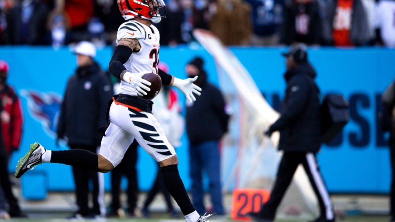 Cincinnati Bengals free safety Jessie Bates (30) celebrates after an interception during an NFL divisional playoff football game, Saturday, Jan. 22, 2022, at Nissan Stadium in Nashville, Tenn. Cincinnati Bengals defeated Tennessee Titans 19-16.

Cincinnati Bengals At Tennessee Titans Divisional Playoff 70