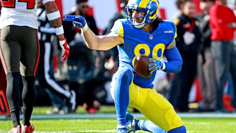 Jan 23, 2022; Tampa, Florida, USA; Los Angeles Rams tight end Tyler Higbee (89) reacts after a catch during the first quarter against the Tampa Bay Buccaneers in a NFC Divisional playoff football game at Raymond James Stadium. Mandatory Credit: Matt Pendleton-USA TODAY Sports