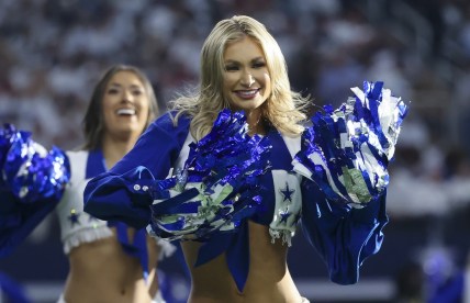 Jan 16, 2022; Arlington, Texas, USA; Dallas Cowboys cheerleader in action during the NFC Wild Card playoff football game against the San Francisco 49ers at AT&T Stadium. Mandatory Credit: Kevin Jairaj-USA TODAY Sports