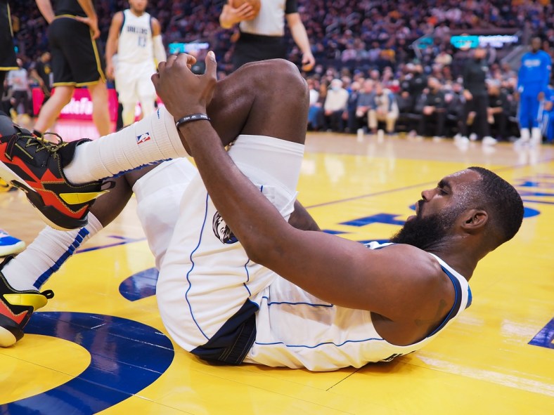 Jan 25, 2022; San Francisco, California, USA; Dallas Mavericks guard Tim Hardaway Jr. (11) on the court after an injury during the second quarter against the Golden State Warriors at Chase Center. Mandatory Credit: Kelley L Cox-USA TODAY Sports