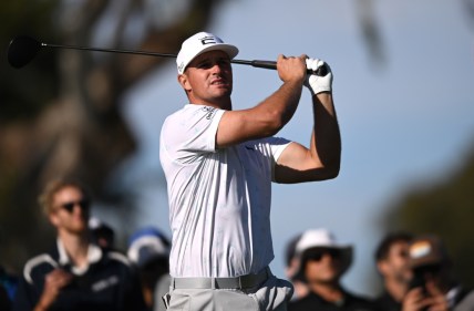 Jan 27, 2022; San Diego, California, USA; Bryson DeChambeau plays his shot from the ninth tee during the first round of the Farmers Insurance Open golf tournament at Torrey Pines Municipal Golf Course - North Course. Mandatory Credit: Orlando Ramirez-USA TODAY Sports