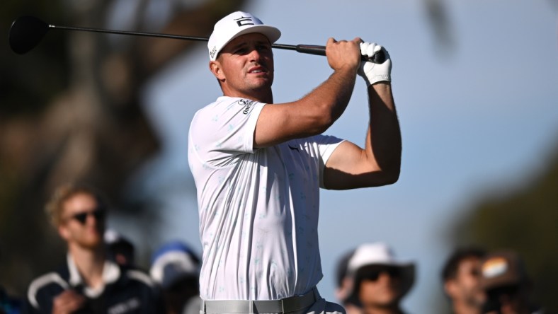 Jan 27, 2022; San Diego, California, USA; Bryson DeChambeau plays his shot from the ninth tee during the first round of the Farmers Insurance Open golf tournament at Torrey Pines Municipal Golf Course - North Course. Mandatory Credit: Orlando Ramirez-USA TODAY Sports