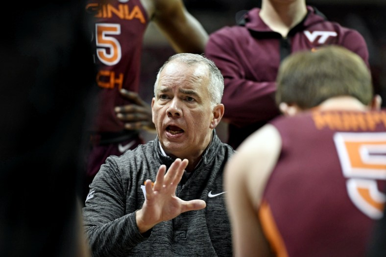 Jan 29, 2022; Tallahassee, Florida, USA; Virginia Tech Hokies head coach Mike Young talks to his team during the first half of the game against the Florida State Seminoles at Donald L. Tucker Center. Mandatory Credit: Melina Myers-USA TODAY Sports