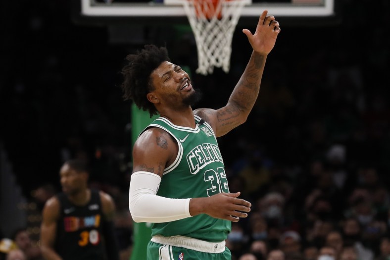 Jan 31, 2022; Boston, Massachusetts, USA; Boston Celtics guard Marcus Smart (36) reacts to missing a shot against the Miami Heat during the second quarter at TD Garden. Mandatory Credit: Winslow Townson-USA TODAY Sports