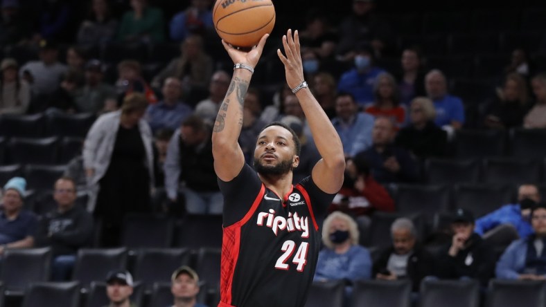 Jan 31, 2022; Oklahoma City, Oklahoma, USA; Portland Trail Blazers forward Norman Powell (24) shoots a three pointer against the Oklahoma City Thunder during the second quarter at Paycom Center. Mandatory Credit: Alonzo Adams-USA TODAY Sports