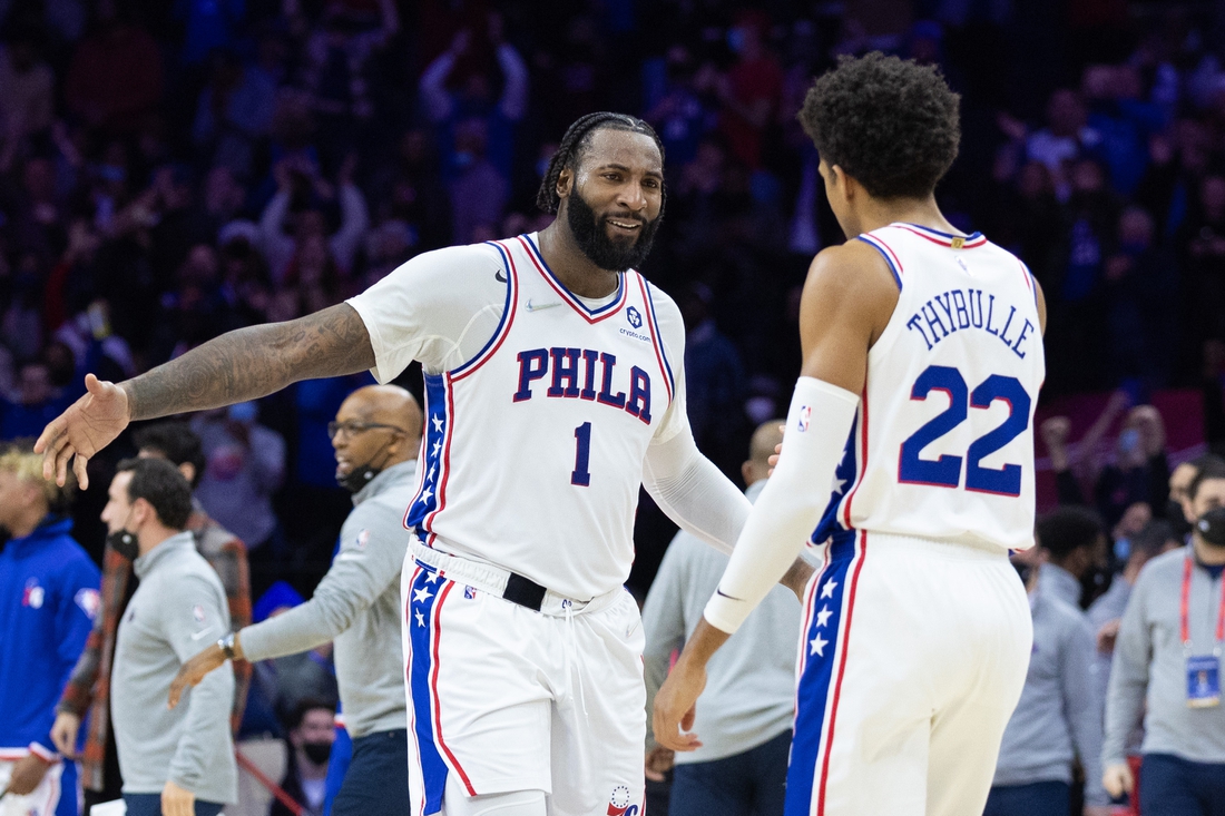 Jan 31, 2022; Philadelphia, Pennsylvania, USA; Philadelphia 76ers center Andre Drummond (1) and guard Matisse Thybulle (22) celebrate a victory against the Memphis Grizzlies at Wells Fargo Center. Mandatory Credit: Bill Streicher-USA TODAY Sports