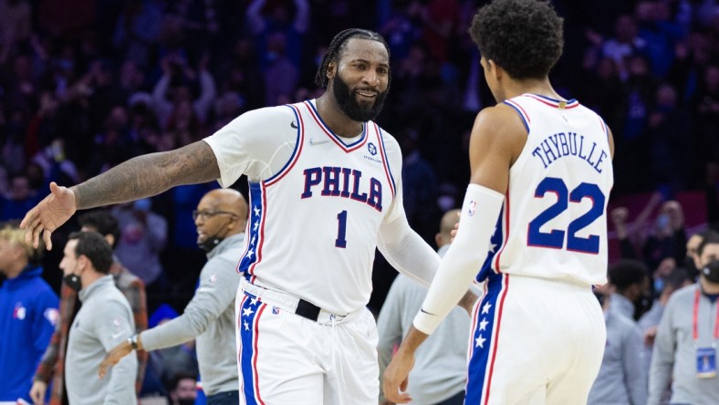 Jan 31, 2022; Philadelphia, Pennsylvania, USA; Philadelphia 76ers center Andre Drummond (1) and guard Matisse Thybulle (22) celebrate a victory against the Memphis Grizzlies at Wells Fargo Center. Mandatory Credit: Bill Streicher-USA TODAY Sports