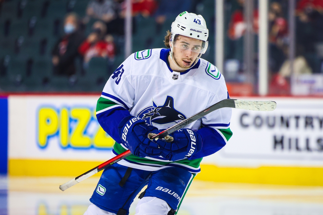 Jan 29, 2022; Calgary, Alberta, CAN; Vancouver Canucks defenseman Quinn Hughes (43) skates against the Calgary Flames during the third period at Scotiabank Saddledome. Mandatory Credit: Sergei Belski-USA TODAY Sports