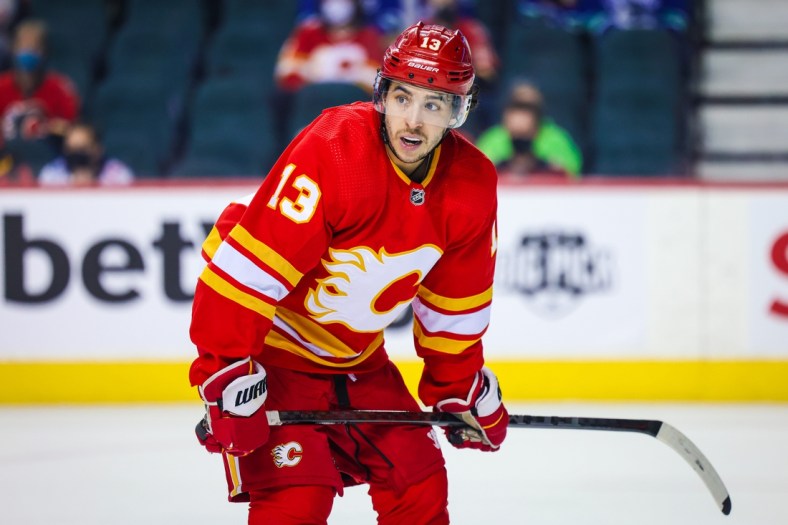 Jan 29, 2022; Calgary, Alberta, CAN; Calgary Flames left wing Johnny Gaudreau (13) during the face off against the Vancouver Canucks during the third period at Scotiabank Saddledome. Mandatory Credit: Sergei Belski-USA TODAY Sports