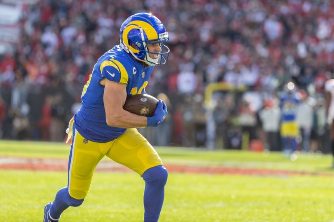 Jan 23, 2022; Tampa, Florida, USA; Los Angeles Rams wide receiver Cooper Kupp (10) runs with the ball during the first half against the Tampa Bay Buccaneers during a NFC Divisional playoff football game at Raymond James Stadium. Mandatory Credit: Matt Pendleton-USA TODAY Sports
