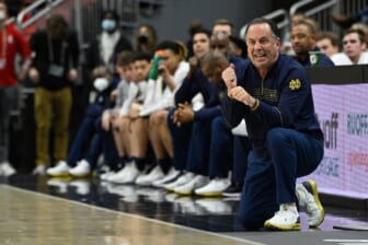 Jan 22, 2022; Louisville, Kentucky, USA;  Notre Dame Fighting Irish head coach Mike Brey reacts during the second half against the Louisville Cardinals at KFC Yum! Center. Notre Dame defeated Louisville 82-70. Mandatory Credit: Jamie Rhodes-USA TODAY Sports