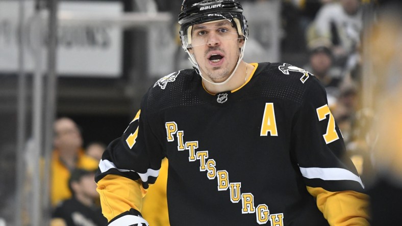 Jan 28, 2022; Pittsburgh, Pennsylvania, USA;  Pittsburgh Penguins  center Evgeni Malkin (72) waits for a face off against the Detroit Red Wings in the second period at PPG Paints Arena. Mandatory Credit: Philip G. Pavely-USA TODAY Sports