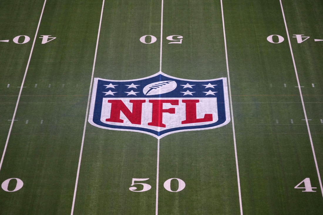 Feb 1, 2022; Inglewood, CA, USA; The NFL shield logo is seen at midfield at SoFi Stadium. Super Bowl LVI between the Los Angeles Rams and the Cincinnati Bengals will be played on Feb. 13, 2022. Mandatory Credit: Kirby Lee-USA TODAY Sports