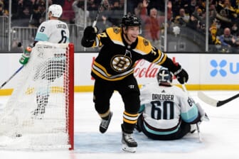 Feb 1, 2022; Boston, Massachusetts, USA; Boston Bruins left wing Taylor Hall (71) reacts after a goal scored by right wing David Pastrnak (not seen) against the Seattle Kraken during the third period at the TD Garden. Mandatory Credit: Brian Fluharty-USA TODAY Sports