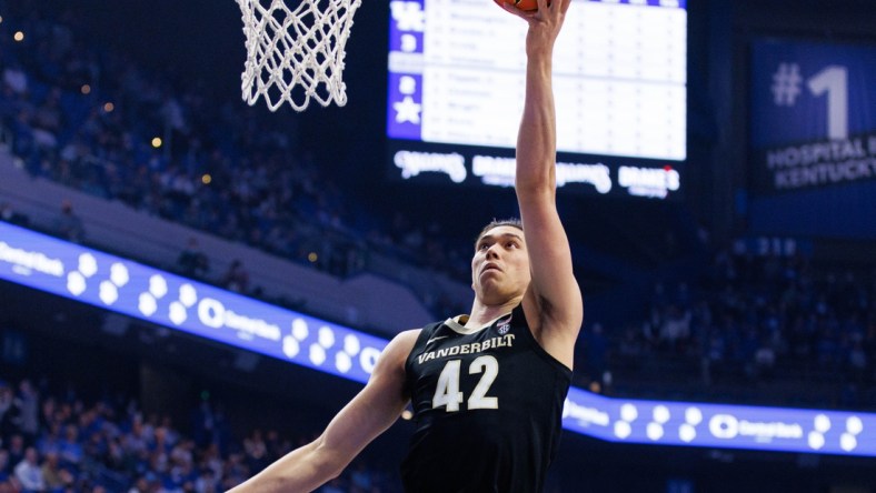 Feb 2, 2022; Lexington, Kentucky, USA; Vanderbilt Commodores forward Quentin Millora-Brown (42) goes to the basket during the first half against the Kentucky Wildcats at Rupp Arena at Central Bank Center. Mandatory Credit: Jordan Prather-USA TODAY Sports