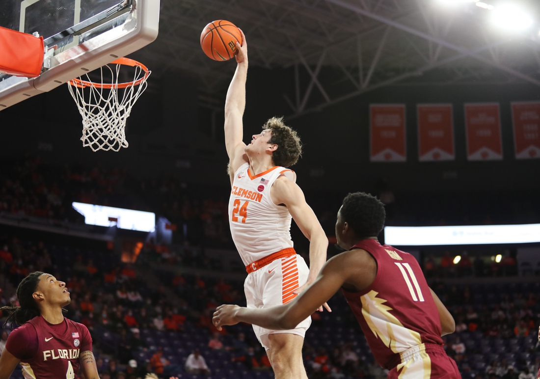 Feb 2, 2022; Clemson, South Carolina, USA; Clemson Tigers forward PJ Hall (24) dunks the ball during the first half against the Florida State Seminoles at Littlejohn Coliseum. Mandatory Credit: Dawson Powers-USA TODAY Sports