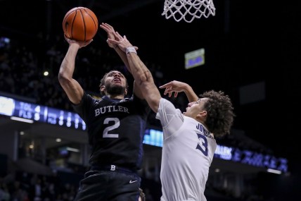 Feb 2, 2022; Cincinnati, Ohio, USA; Butler Bulldogs guard Aaron Thompson (2) shoots against Xavier Musketeers guard Colby Jones (3) in the first half at Cintas Center. Mandatory Credit: Katie Stratman-USA TODAY Sports