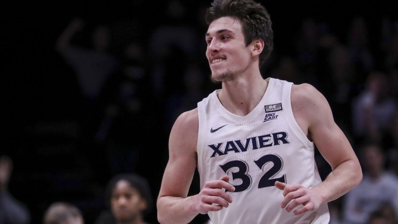 Feb 2, 2022; Cincinnati, Ohio, USA; Xavier Musketeers forward Zach Freemantle (32) reacts after a play against the Butler Bulldogs in the second half at Cintas Center. Mandatory Credit: Katie Stratman-USA TODAY Sports