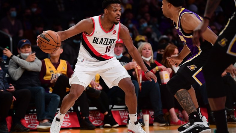 Feb 2, 2022; Los Angeles, California, USA; Portland Trail Blazers guard Dennis Smith Jr. (10) controls the ball against the Los Angeles Lakers during the first half at Crypto.com Arena. Mandatory Credit: Gary A. Vasquez-USA TODAY Sports