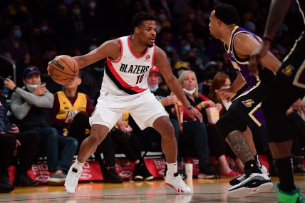 Feb 2, 2022; Los Angeles, California, USA; Portland Trail Blazers guard Dennis Smith Jr. (10) controls the ball against the Los Angeles Lakers during the first half at Crypto.com Arena. Mandatory Credit: Gary A. Vasquez-USA TODAY Sports